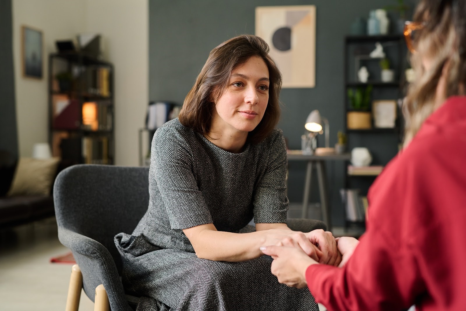 A patient and doctor discuss new treatments for anxiety in a comfortable office.