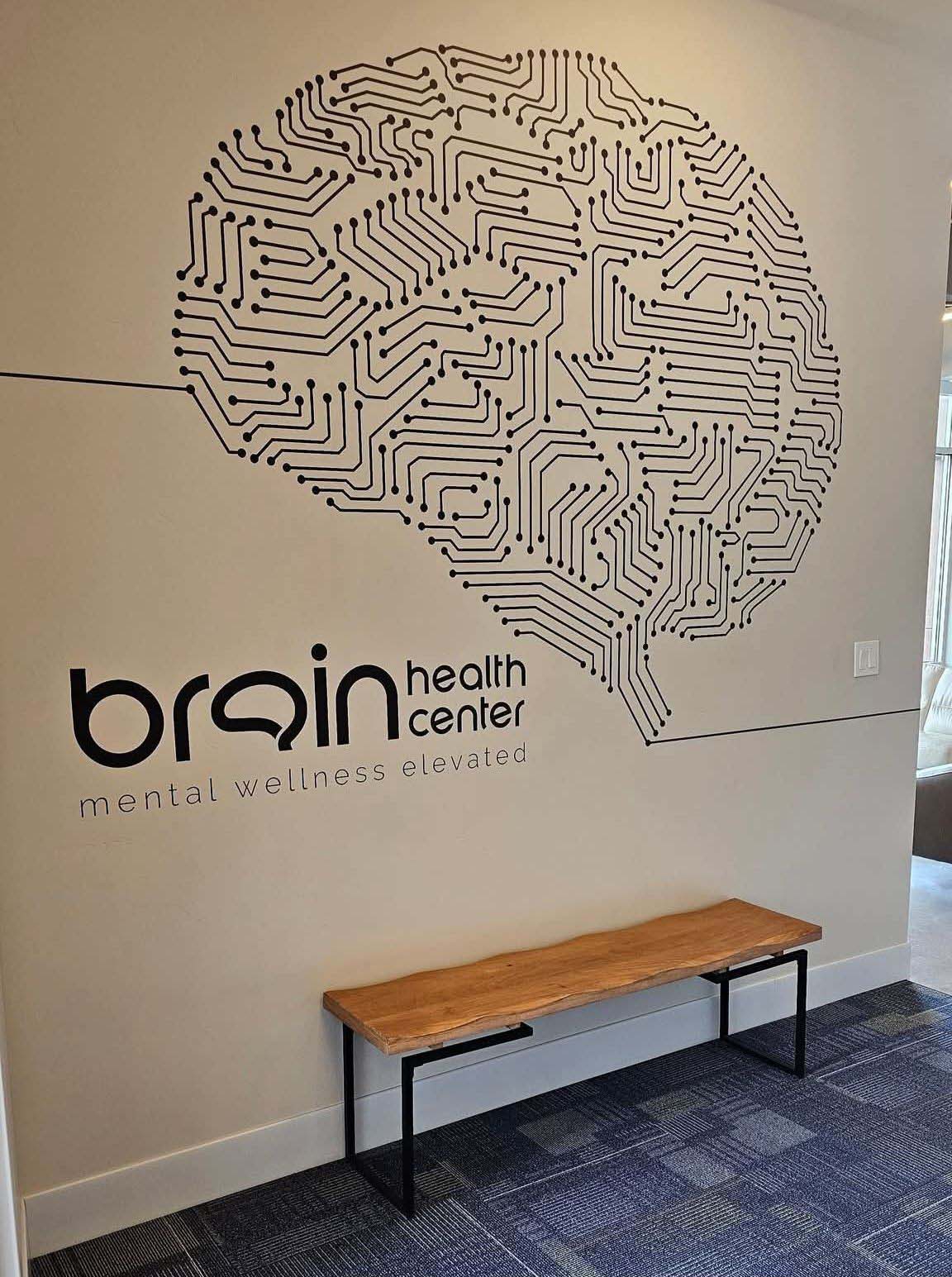  A large building with multiple cars parked outside 